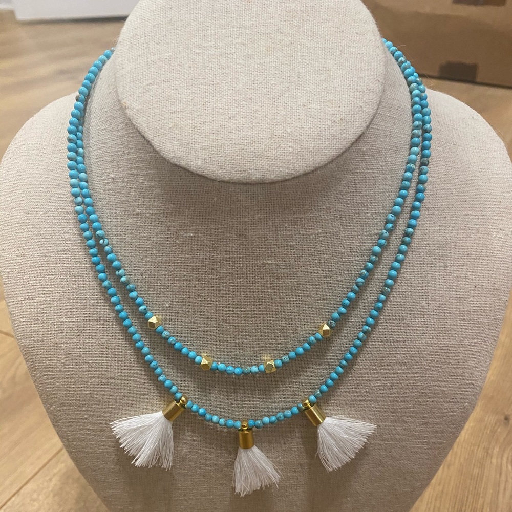 Turquoise beaded necklace with white tassels
